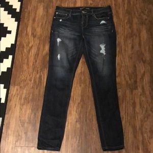 Express dark wash ripped denim leggings in size 8R